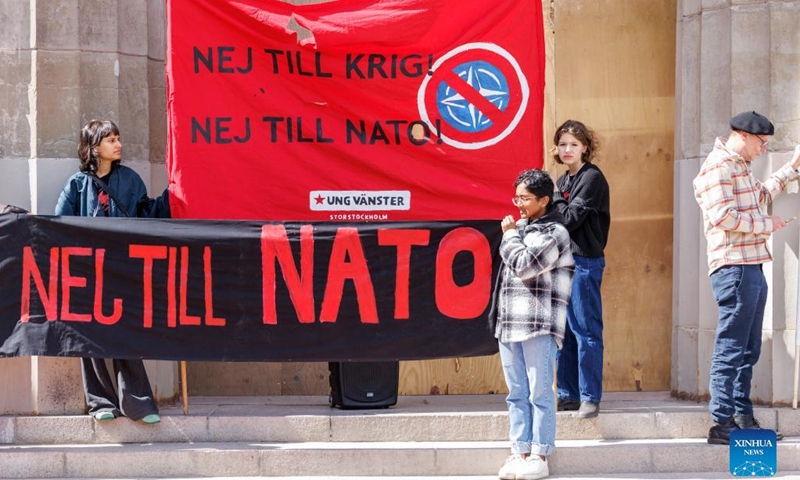 People protest against Sweden's decision to apply to join the North Atlantic Treaty Organization (NATO) in Stockholm, Sweden, May 16, 2022. Swedish Prime Minister Magdalena Andersson on Monday announced the official decision to start the process of the country's application to become a member of the NATO.(Photo: Xinhua)