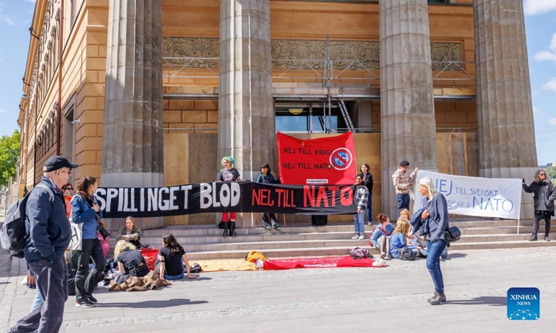 People protest against Sweden's decision to apply to join the North Atlantic Treaty Organization (NATO) in Stockholm, Sweden, May 16, 2022. Swedish Prime Minister Magdalena Andersson on Monday announced the official decision to start the process of the country's application to become a member of the NATO.(Photo: Xinhua)