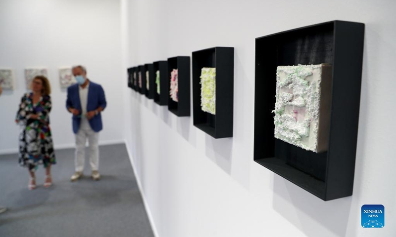People visit the ARCOlisboa international contemporary art fair in Lisbon, Portugal, on May 19, 2022. The ARCOlisboa 2022 which kicked off on Thursday, will last till May 22.(Photo: Xinhua)