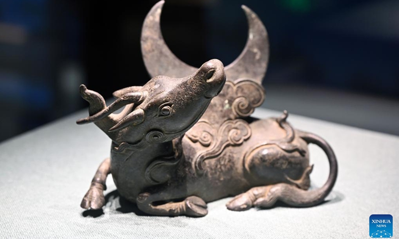 A rhinoceros-shaped mirror bracket of the Qing Dynasty (1644-1911) is exhibited at Hainan Museum in Haikou, south China's Hainan Province, May 18, 2022. May 18 marks the International Museum Day. An exhibition highlighting animal-shaped cultural relics opened Wednesday to the public at Hainan Museum in Haikou. As many as 150 selected animal-themed culture relics are on display during the exhibition.(Photo: Xinhua)