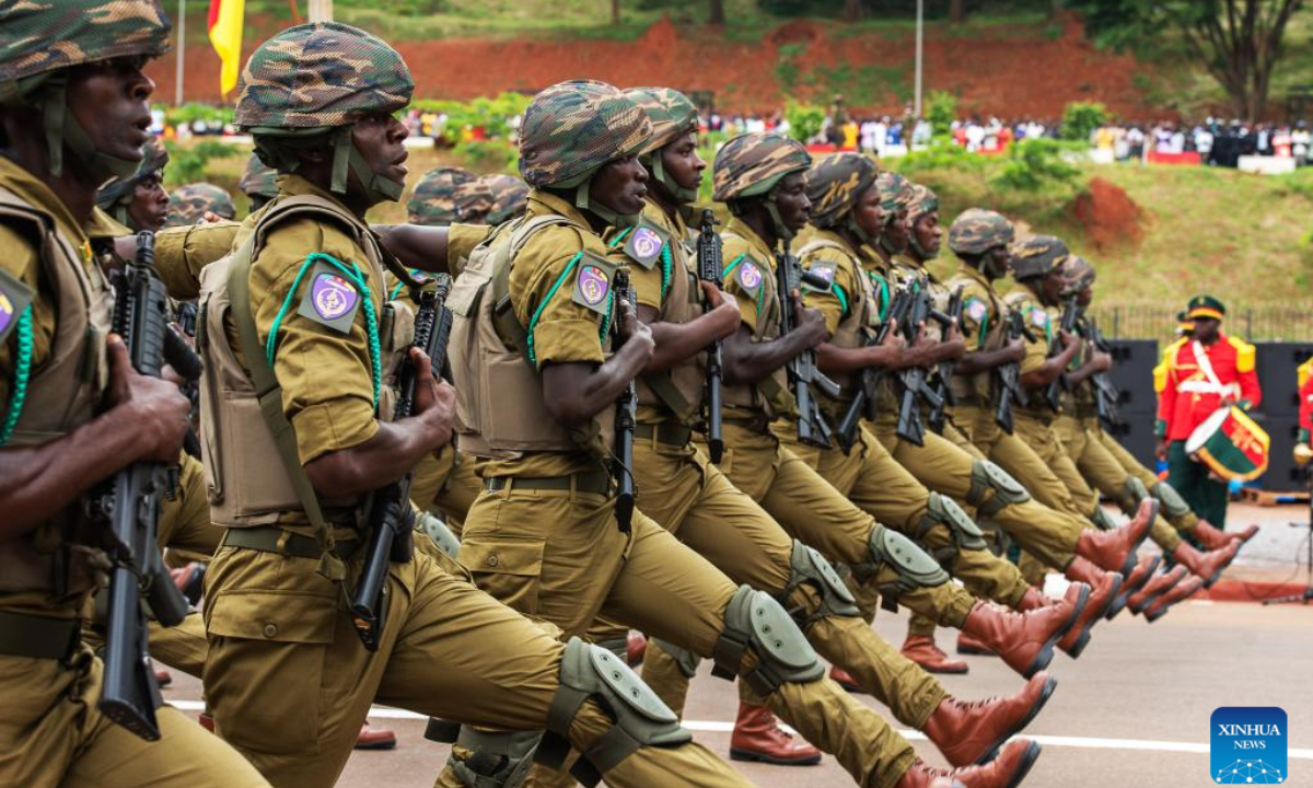 Soldiers take part in a parade to celebrate the National Day in Yaounde, Cameroon, on May 20, 2022. Cameroon marked on Friday the 50th anniversary of its National Day with a military and civilian parade for the first time since the first case of coronavirus was detected in the Central African nation in March 2020. Photo:Xinhua