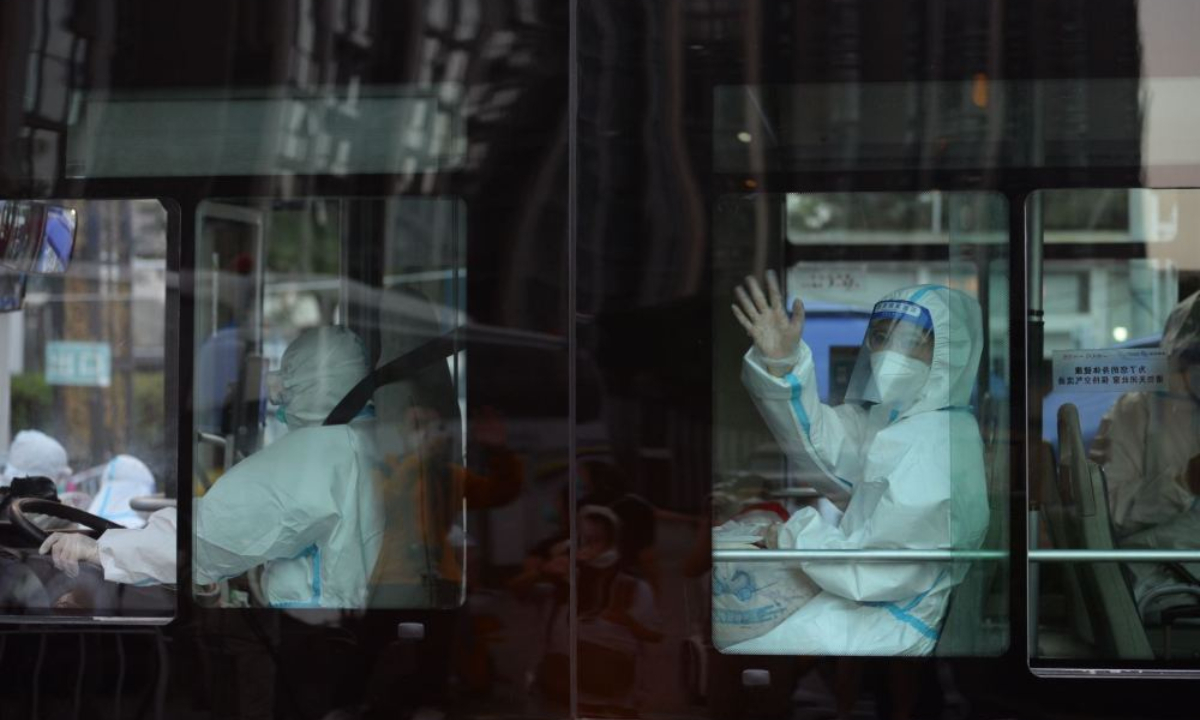Nearly 5,000 residents of a community in Beijing's Chaoyang district are transferred to 57 hotels for a seven-day quarantine as 26 confirmed COVID19 cases have been discovered in eight building blocks of the community recently. Photo: Beijing Daily