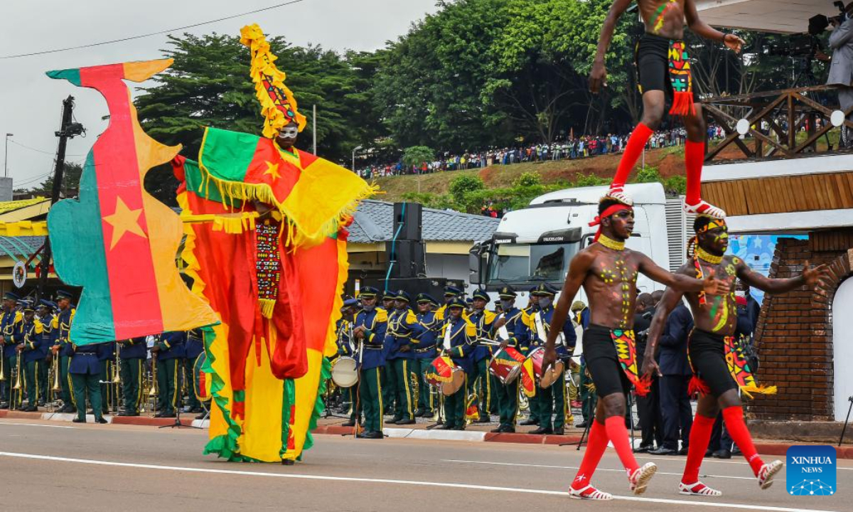 People take part in a parade to celebrate the National Day in Yaounde, Cameroon, on May 20, 2022. Cameroon marked on Friday the 50th anniversary of its National Day with a military and civilian parade for the first time since the first case of coronavirus was detected in the Central African nation in March 2020. Photo:Xinhua
