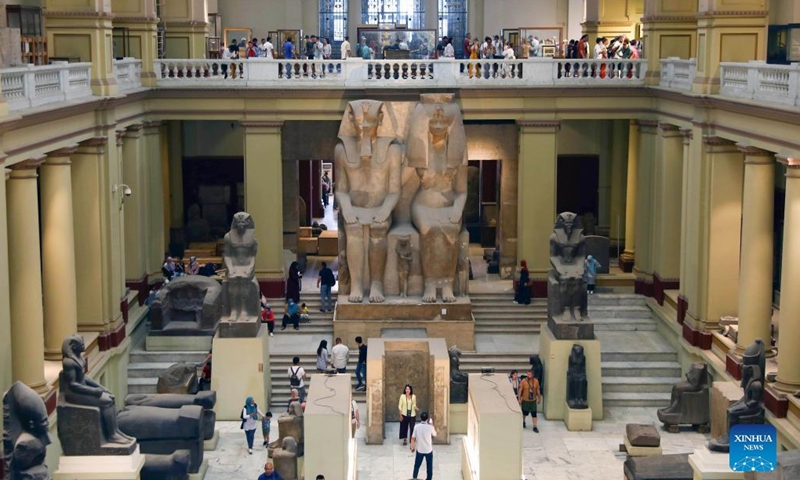 Tourists visit exhibits during the International Museum Day at the Egyptian Museum in Cairo, Egypt, on May 18, 2022. The Egyptian Museum on Wednesday organized a number of free tour guides for visitors of all ages on the International Museum Day, which annually falls on May 18.(Photo: Xinhua)