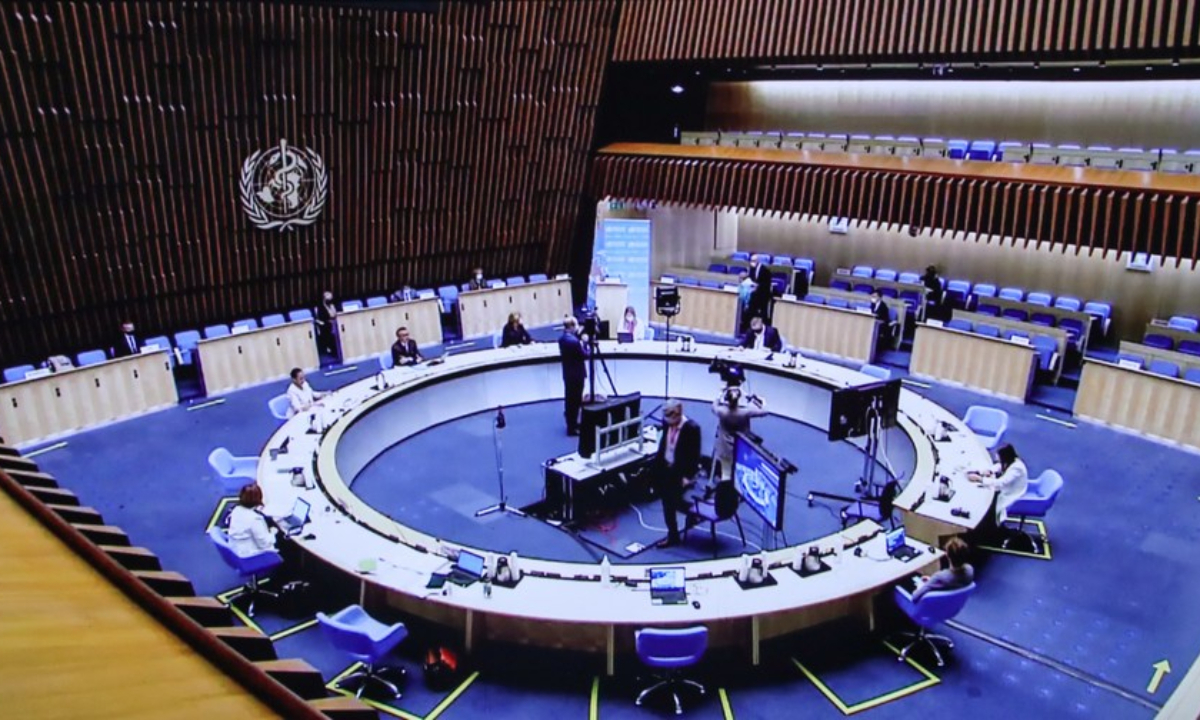 Photo taken in Brussels, Belgium on May 24, 2021 shows the live stream of the 74th World Health Assembly held at the World Health Organization (WHO) headquarters in Geneva, Switzerland. Photo:Xinhua