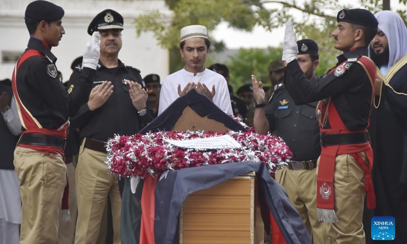 People pray at a funeral of a policeman in Peshawar, Pakistan, on May 19, 2022. Two policemen including an officer were killed in a terrorist attack in Pakistan's northwestern Khyber Pakhtunkhwa province on Thursday, police and rescue teams said.(Photo: Xinhua)