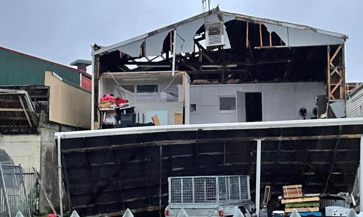 Photo shows a damaged house after a tornado in Levin, New Zealand, May 20, 2022. A tornado swept through the town of Levin, some 90 km north of the New Zealand capital Wellington, leaving trees downed and roofs torn apart from houses early morning of Friday, local media reported. Photo:Xinhua