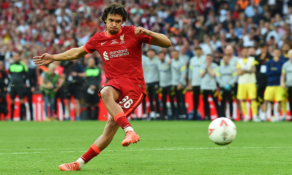 Trent Alexander-Arnold of Liverpool takes his penalty at the end of the FA Cup final match at Wembley Stadium on May 14, 2022 in London, England. Photo: VCG