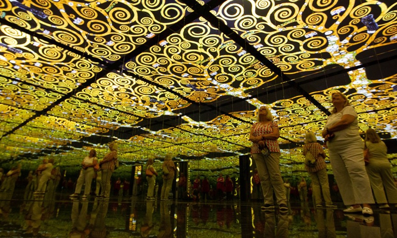 Visitors view digital artworks at an exhibition at Fabrique des Lumieres in Amsterdam, the Netherlands, on May 18, 2022.Photo:Xinhua