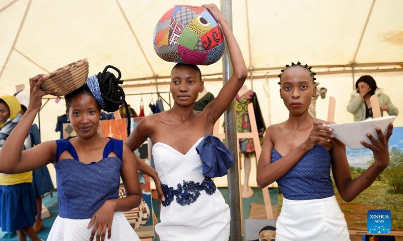 Models display traditional weaved baskets during Botswana's National Culture Day in Mochudi, Kgatleng District, Botswana, on May 21, 2022.Photo:Xinhua