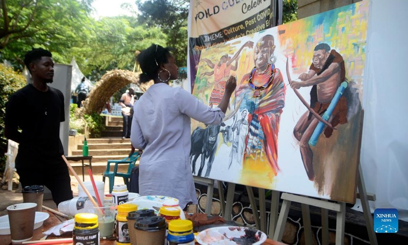 An artist works on a painting during an event to mark World Day for Cultural Diversity for Dialogue and Development at Uganda National Cultural Center in Kampala, Uganda, on May 21, 2022.Photo:Xinhua