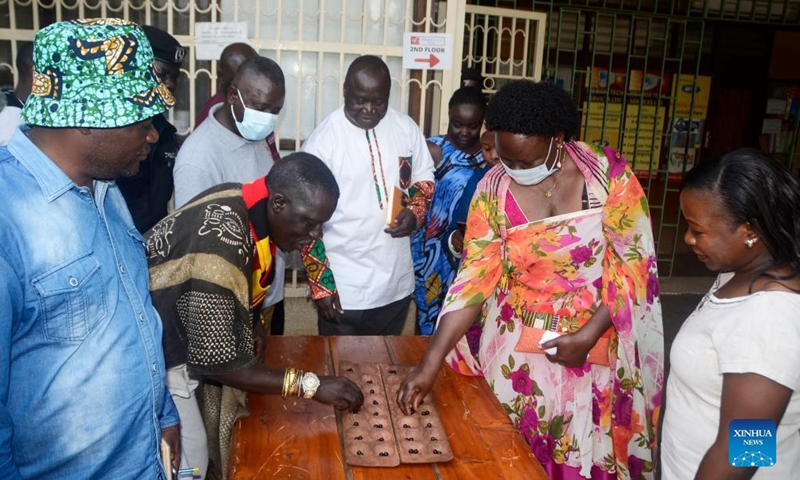 Visitors play a board game popularly known as Omweso during an event to mark World Day for Cultural Diversity for Dialogue and Development at Uganda National Cultural Center in Kampala, Uganda, on May 21, 2022.Photo:Xinhua