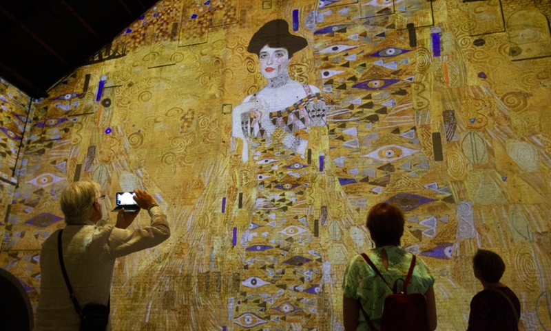 Visitors view digital artworks at an exhibition at Fabrique des Lumieres in Amsterdam, the Netherlands, on May 18, 2022.Photo:Xinhua