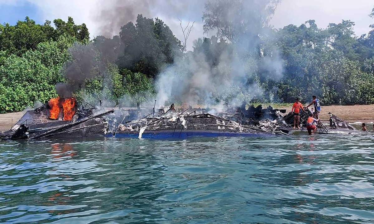 This handout photo taken and released on May 23, 2022 from the Philippine Coast Guard shows the remains of a ferry near Real town, Quezon Province, the Philippines. Photo: AFP