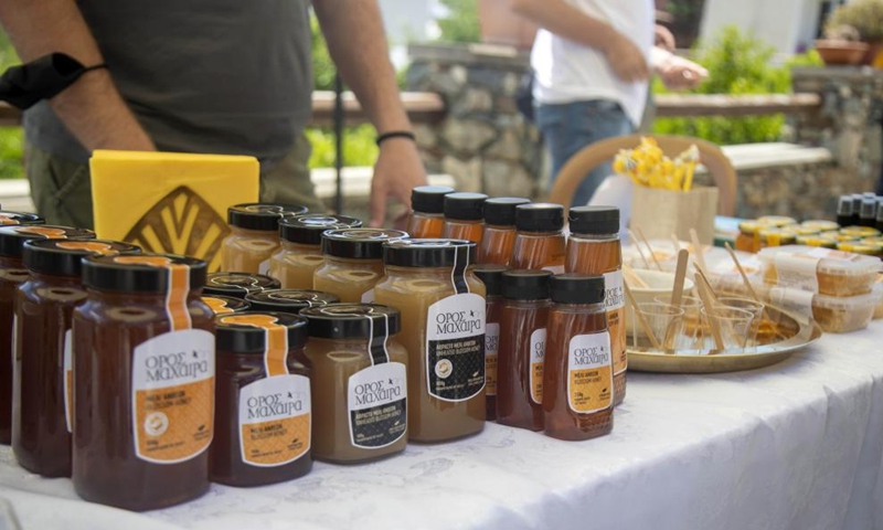 Honey products are displayed at a bee festival in Ora village in Larnaca, Cyprus, on May 22, 2022.Photo:Xinhua