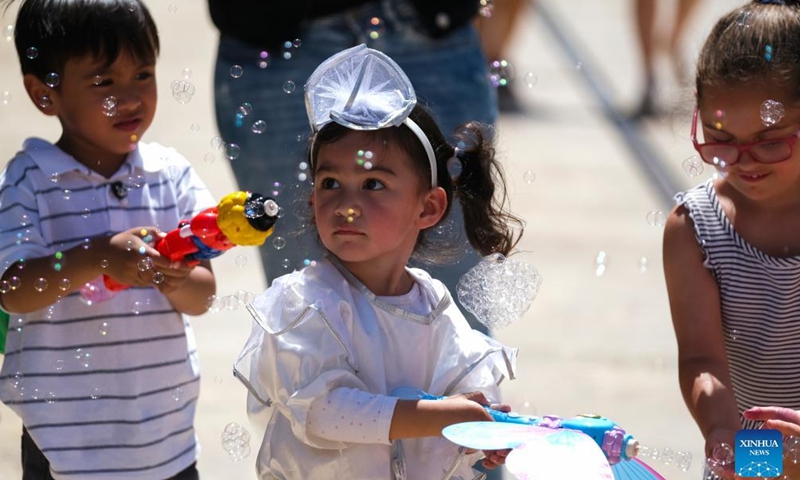 Children are seen at the Malta carnival in Valletta, Malta, on May 22, 2022.Photo:Xinhua