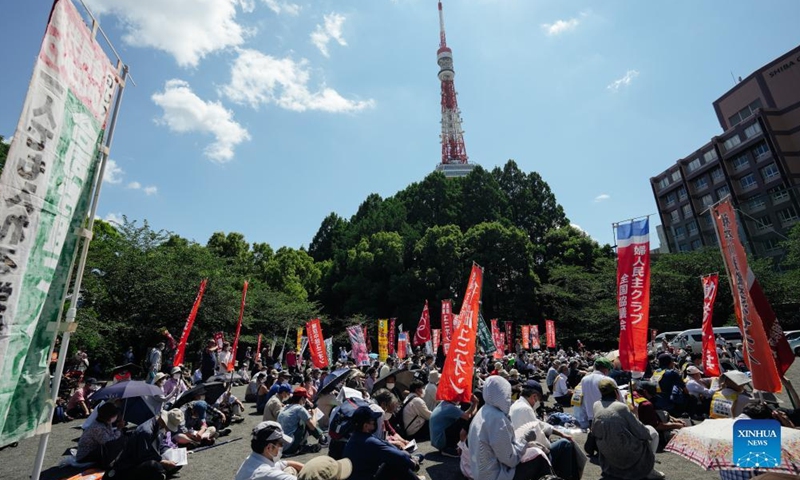 Protesters gather at Shiba Park in Tokyo, Japan, May 22, 2022. U.S. President Joe Biden arrived in Japan on Sunday, as about 750 protesters took to the streets here against the planned U.S.-Japan summit and the summit of the Quadrilateral Security Dialogue (the Quad).Photo:Xinhua