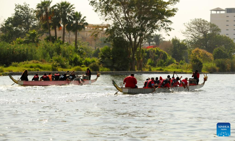 People attend a dragon boat race experiencing activity on the Nile River in Cairo, Egypt, on June 3, 2022. A dragon boat race experiencing activity was held here on Friday to celebrate the traditional Chinese Dragon Boat Festival. (Xinhua/Sui Xiankai)