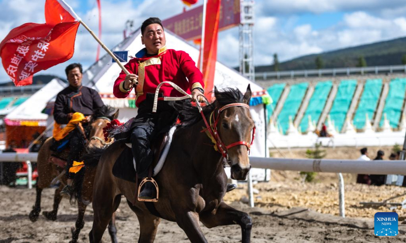 Riders perform equestrian show at a horse racing festival held in Shangri-La, Deqen Tibetan Autonomous Prefecture, southwest China's Yunnan Province, June 3, 2022. (Xinhua/Cao Mengyao)