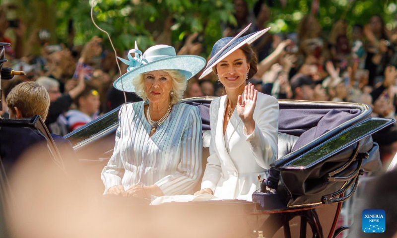 Britain's Camilla (L), Duchess of Cornwall, and Catherine, Duchess of Cambridge, ride in a carriage during the Trooping the Colour parade in celebration of Britain's Queen Elizabeth II's Platinum Jubilee, in London, Britain, on June 2, 2022. (Photo by Tim Ireland/Xinhua)