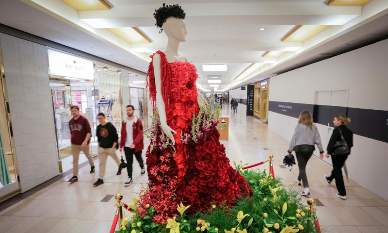 A mannequin decorated with flowers is displayed inside Vancouver Art Gallery in Vancouver, British Columbia, Canada, on June 3, 2022. The Fleurs de Villes FEMMES, a floral art exhibition, kicked off on Friday in Vancouver to celebrate and depict significant women through time. (Photo by Liang Sen/Xinhua)