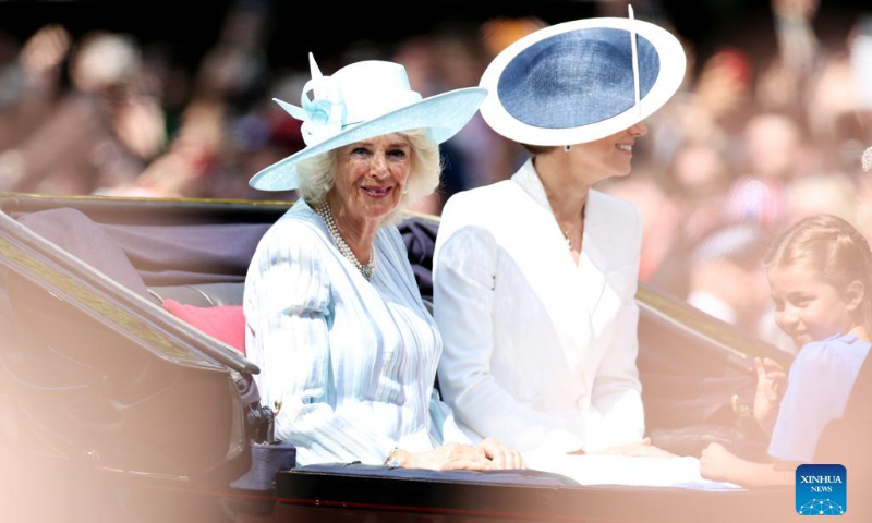 Britain's Camilla (L), Duchess of Cornwall, and Catherine, Duchess of Cambridge, ride in a carriage during the Trooping the Colour parade in celebration of Britain's Queen Elizabeth II's Platinum Jubilee, in London, Britain, on June 2, 2022. (Xinhua/Li Ying)