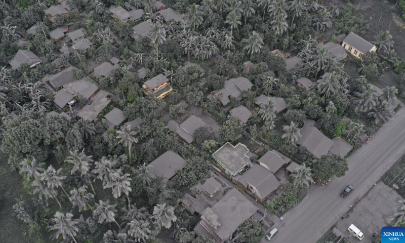 Aerial photo shows an ash-covered town after the phreatic eruption of Bulusan volcano in Sorsogon Province, the Philippines on June 5, 2022. The Philippine Institute of Volcanology and Seismology on Sunday raised the alert level for Bulusan volcano from zero to one after the volcano in Sorsogon province, southeast of Manila, spewed a grey plume about a kilometer high into the sky. Photo: Xinhua