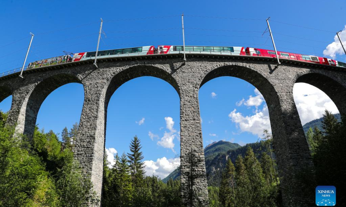 A train runs on the Rhaetian Railway in the Albula/Bernina landscapes in Switzerland, May 26, 2022. The Rhaetian Railway in the Albula/Bernina landscapes was included in the UNESCO World Heritage List in 2008. Photo:Xinhua