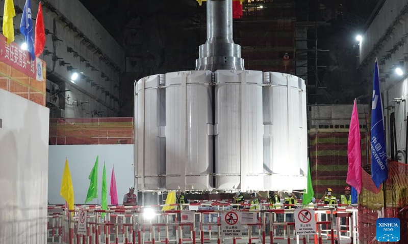 A 200-ton rotor is installed on a generating unit at the Kokhav Hayarden pumped storage power plant in Beit She'an, Israel, on May 25, 2022.(Photo: Xinhua)