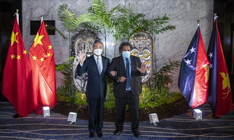 Visiting Chinese State Councilor and Foreign Minister Wang Yi meets Soroi Eoe, minister of foreign affairs and international trade of PNG at Port Moresby in Papua New Guinea, on June 3, 2022. (Xinhua/Bai Xuefei)