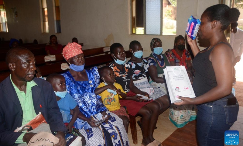 A woman introduces reusable sanitary pads during an event to mark the Menstrual Hygiene Day in Kampala, Uganda, on May 28, 2022.Photo:Xinhua