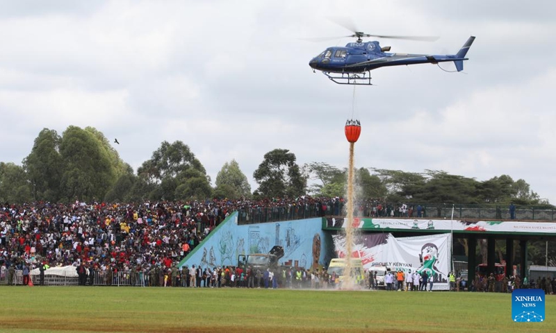 A firefighting helicopter performs during the Museum Air Show Festival in Nairobi, Kenya, on May 28, 2022.Photo:Xinhua