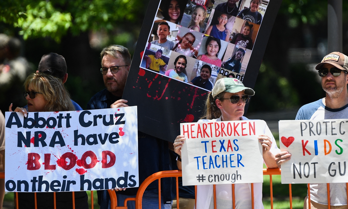 People protest in support of gun control outside the National Rifle Association (NRA) annual meeting at the George R Brown Convention Center in Houston, Texas on May 28,2022.Photo: AFP