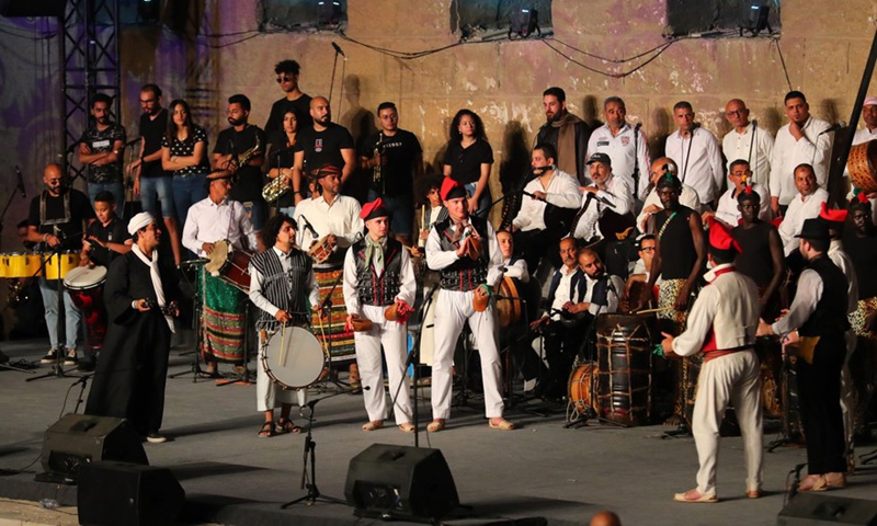Artists perform at the closing ceremony of the 9th International Festival for Drums and Traditional Arts at Saladin Citadel in Cairo, Egypt, on May 28, 2022.Photo:Xinhua