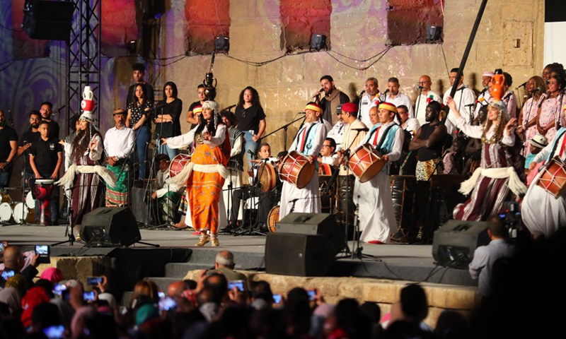 Artists perform at the closing ceremony of the 9th International Festival for Drums and Traditional Arts at Saladin Citadel in Cairo, Egypt, on May 28, 2022.Photo:Xinhua