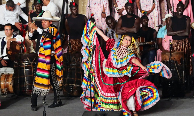 Artists perform at the closing ceremony of the 9th International Festival for Drums and Traditional Arts at Saladin Citadel in Cairo, Egypt, on May 28, 2022.Photo:Xinhua