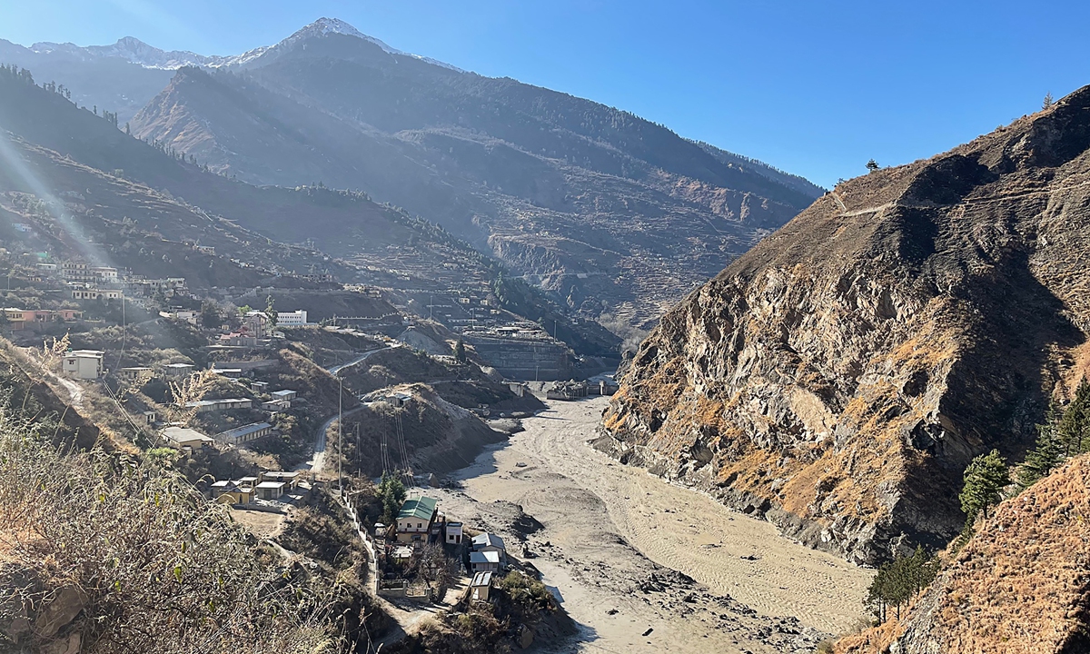An aerial view of the state-run NTPC hydropower project site damaged after a broken glacier caused a major river surge that swept away bridges and roads, near Joshimath in Chamoli district, Uttarakhand, India on February 7, 2021 Photo: AFP