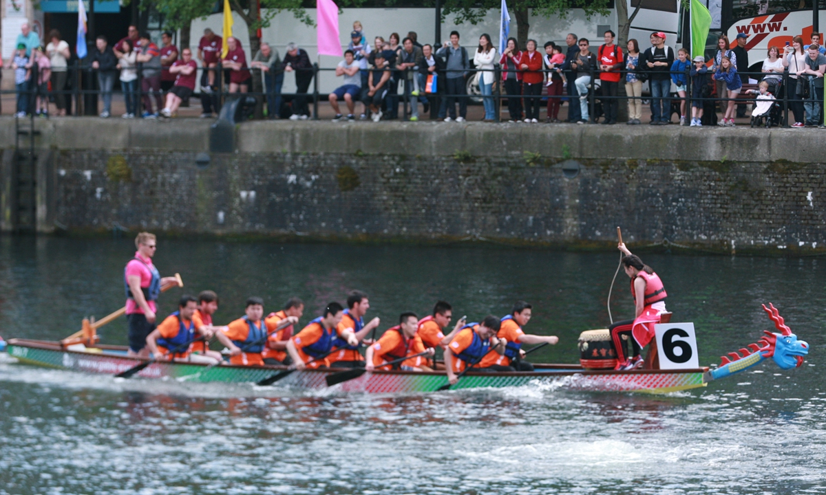 File photo of people attending the dragon boat race in Manchester, the UK Photo: IC