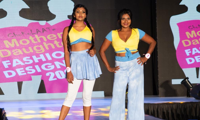Models present creations during the Mother Daughter fashion show in Colombo, Sri Lanka, on May 29, 2022. The highlight of the show is that the designs are modeled by real mother-daughter duos. (Photo: Xinhua)