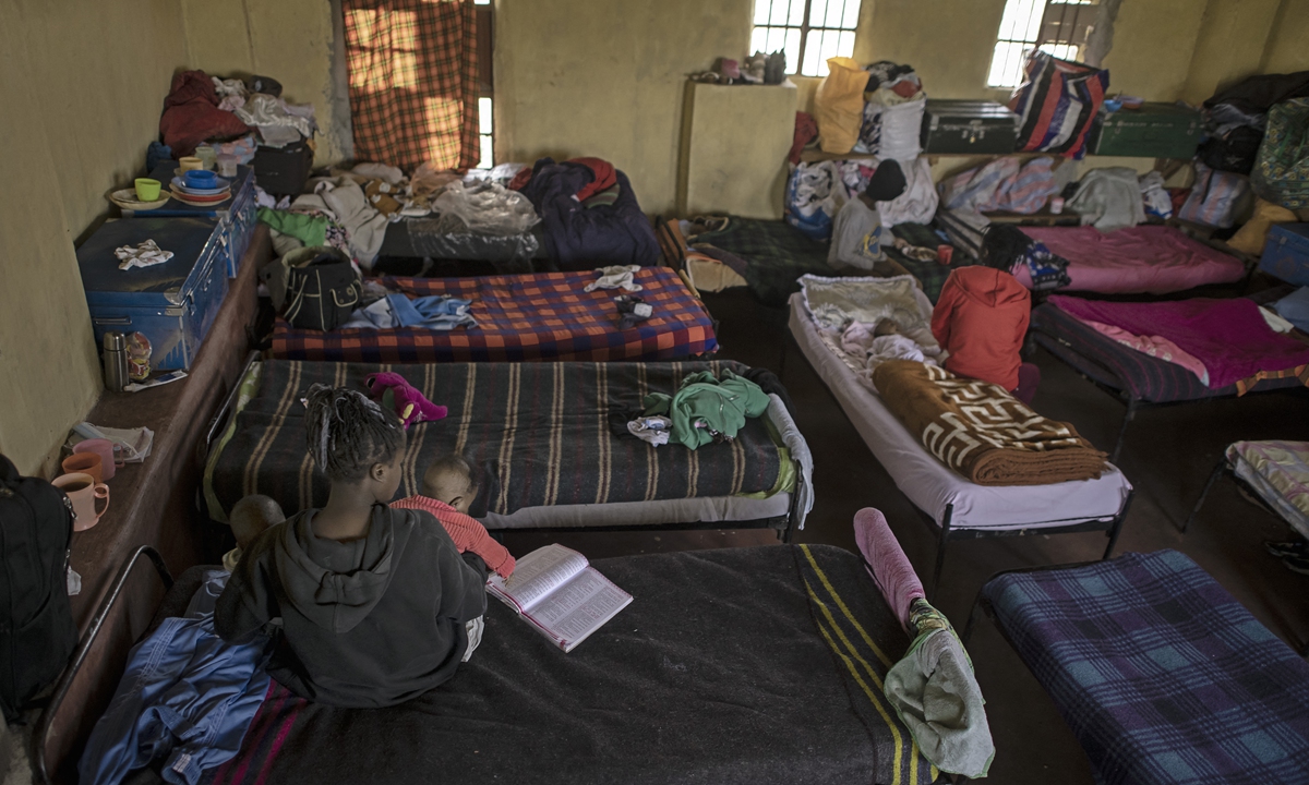 Teen-aged mothers share a dormitory with their infants during a break from their classes at the Serene Haven Girl's Secondary School in Kyeni, Kenya on September 24, 2021. Photo: AFP