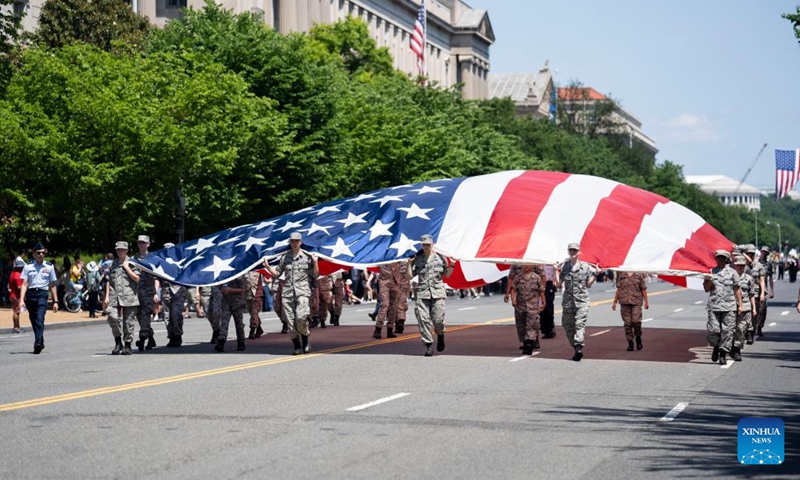 People take part in the Memorial Day Parade in Washington, D.C., the United States, on May 30, 2022. Memorial Day is a U.S. federal holiday observed on the last Monday of May.(Photo: Xinhua)