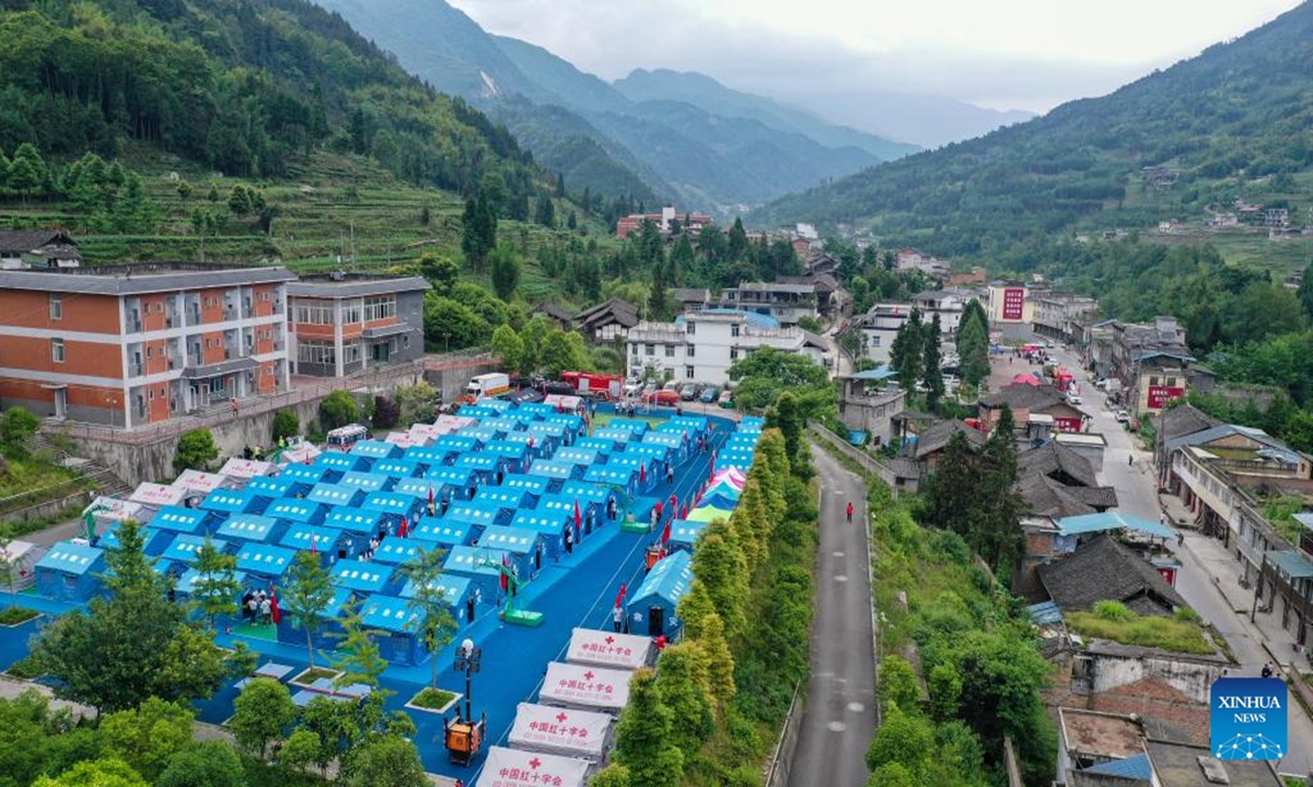 Aerial photo taken on June 2, 2022 shows a temporary shelter at a school in Taiping Town of Lushan County, southwest China's Sichuan Province.

