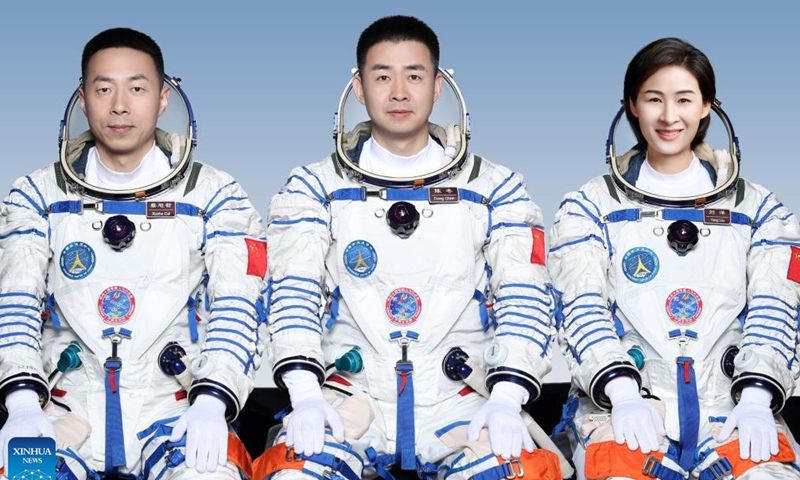 This undated photo shows Chinese astronauts Chen Dong (C), Liu Yang (R) and Cai Xuzhe who will carry out the Shenzhou-14 spaceflight mission. Chinese astronauts Chen Dong, Liu Yang and Cai Xuzhe will carry out the Shenzhou-14 spaceflight mission, and Chen will be the commander, the China Manned Space Agency announced at a press conference Saturday. (Xinhua)