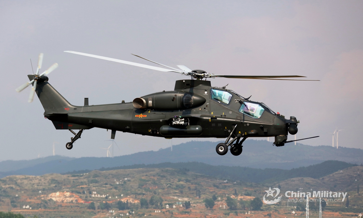 An attack helicopter attached to a brigade under the PLA 75th Group Army lifts off for a flight training task on May 25, 2022. (eng.chinamil.com.cn/Photo by Li Chunguo)