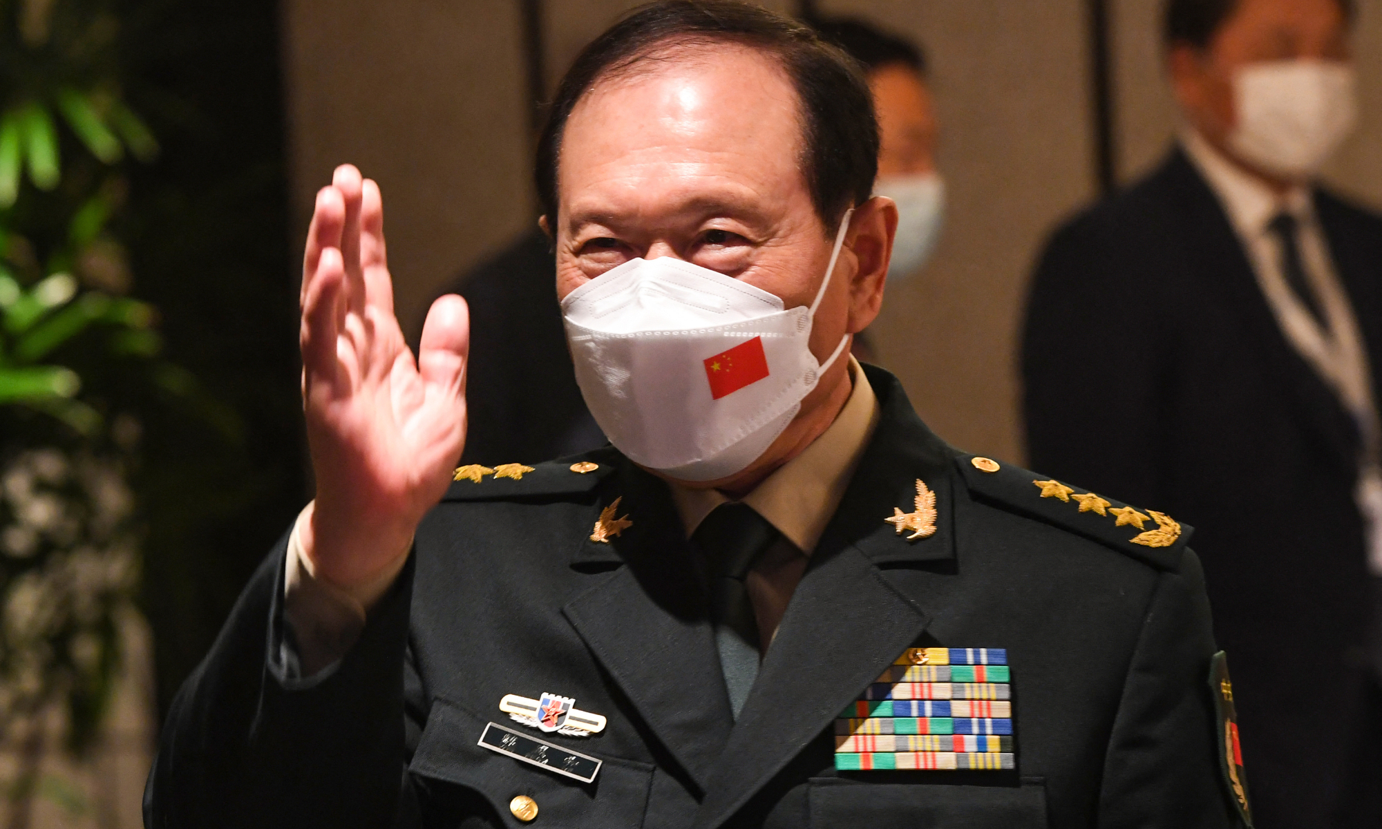 China's State Councilor and Defense Minister Wei Fenghe gestures during the ministerial roundtable luncheon at the Shangri-La Dialogue summit in Singapore on June 11, 2022. Photo:AFP