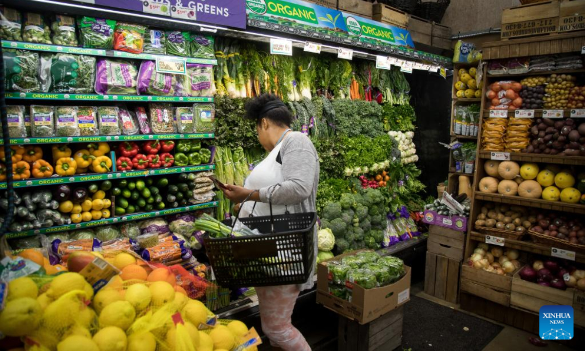 A woman shops at a grocery store in the Brooklyn borough of New York, the United States, on June 10, 2022. US consumer inflation in May surged 8.6 percent from a year ago, indicating inflation remains elevated despite the Federal Reserve's rate hikes, the US Labor Department reported Friday. Photo:Xinhua