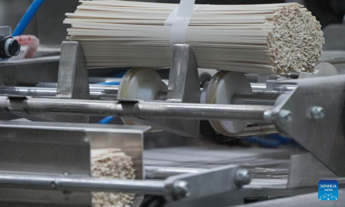 Fine dried noodles are seen on the production line at a wheat processing plant in Woyang County of Bozhou City, east China's Anhui Province, June 7, 2022. Photo:Xinhua