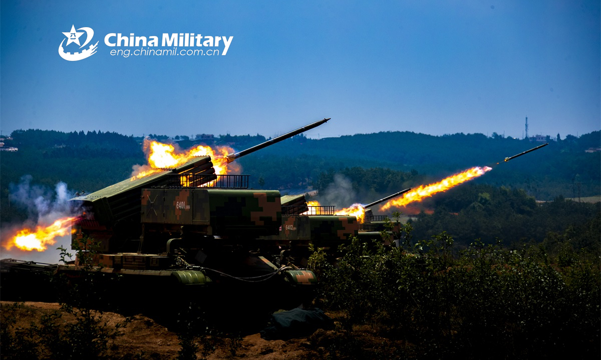 Armored vehicles attached to a combined-arms brigade under the PLA 75th Group Army fire rockets at the mock targets during a live-fire training exercise on May 19, 2022. (eng.chinamil.com.cn/Photo by Tang Zhoutao)