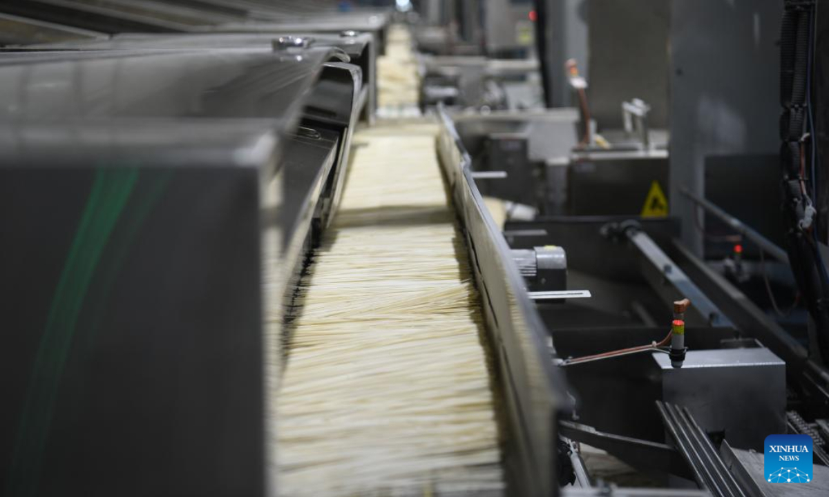 Fine dried noodles are seen on the production line at a wheat processing plant in Woyang County of Bozhou City, east China's Anhui Province, June 7, 2022. Photo:Xinhua