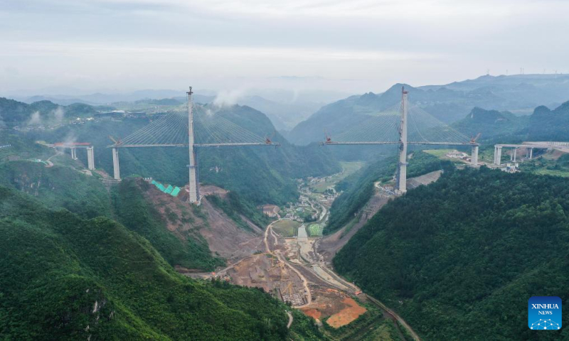 Aerial photo taken on June 14, 2022 shows the construction site of Duohua super major bridge in Longli County, southwest China's Guizhou Province. (Xinhua/Yang Wenbin)